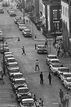 Playing stickball on Seventeenth Street and Eighth Avenue. Brooklyn Gang. New York. USA. 1959. © Bruce Davidson