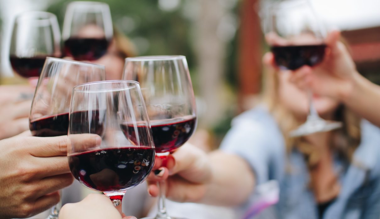 people clinking wine glasses does camp