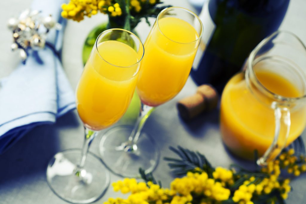 Two,Glasses,With,Mimosa,Cocktail,(cave,Plus,Orange,Juice)