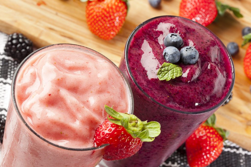fresh,blueberry,and,strawberry,smoothie,on,a,background