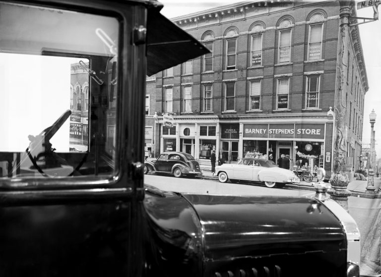 old photo of a model T in downtown columbia