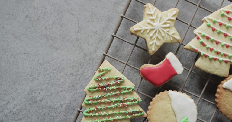 christmas,cookies,in,festive,shapes,cool,on,a,wire,rack,
